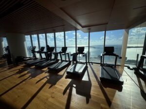 gym equipment including treadmills inside a cruise ship